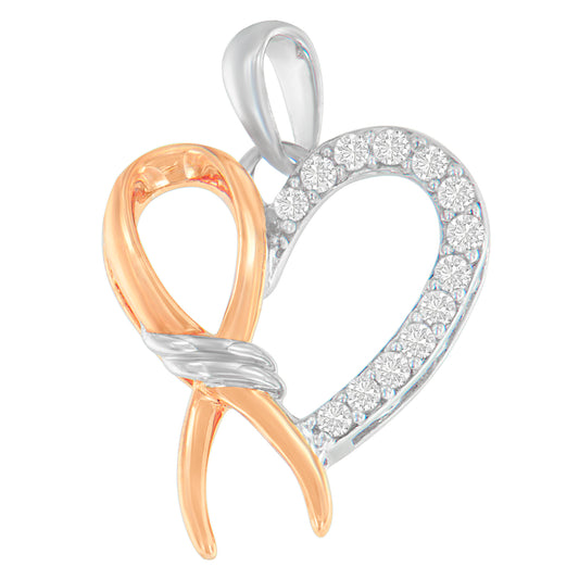 Close-up front view of a two-toned heart-shaped necklace pendant with one side smooth and rose-toned and the other side set with round white gemstones in a prong setting.