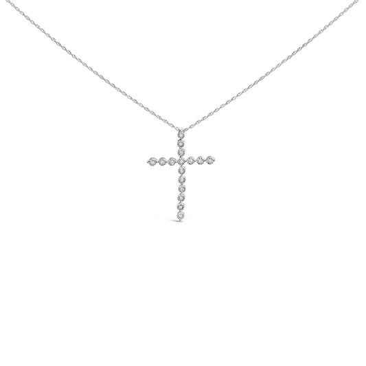 Front view of a white metal cross necklace pendant set with round white gemstones in a miracle setting on a white background.