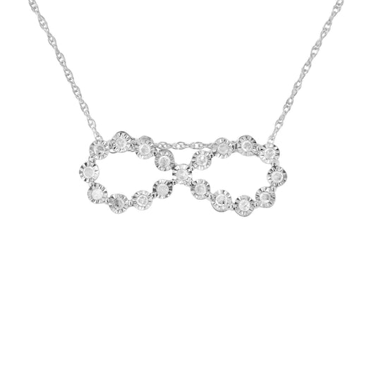 Front view of white metal necklace with infinity symbol pendant featuring round white gemstones in miracle setting.