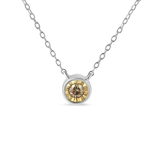 Front view of a white metal necklace with a round brownish gemstone set in a miracle setting pendant.