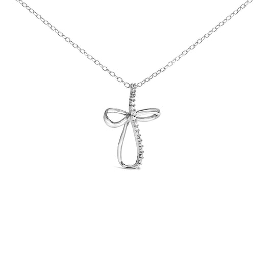 Front view of a white metal necklace with a cross-shaped pendant featuring a ribbon-like design and two round white gemstones in prong settings along one side.