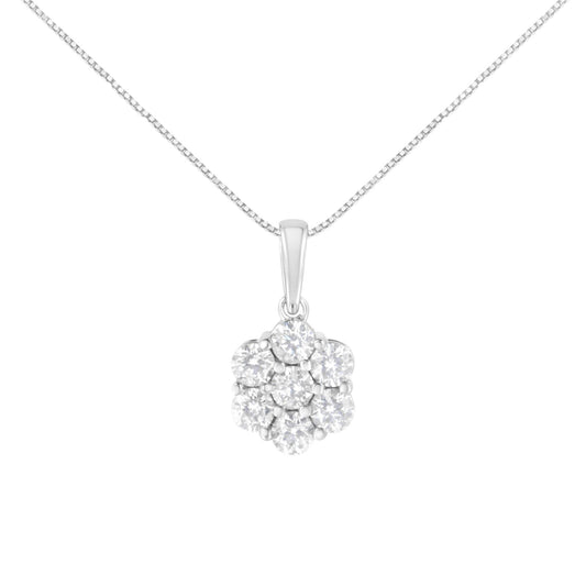 Front view of white metal necklace with a pendant featuring seven round white gemstones in prong settings arranged in a cluster.