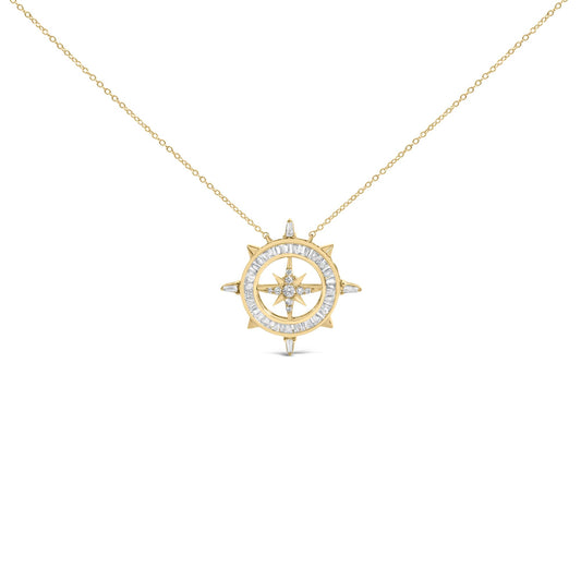 Front-facing close-up of a yellow metal necklace with a compass-shaped pendant featuring white baguette gemstones in a channel setting and round white gemstones in a prong setting, shown on a white background.