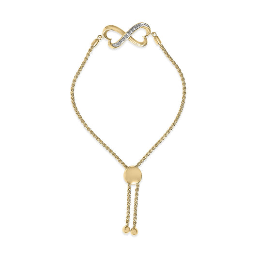 Close-up front view of a yellow bracelet with an infinity heart-shaped centerpiece featuring a row of white gemstones in a pave setting, displayed on a white background.
