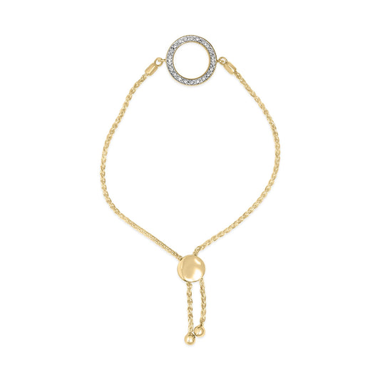 Top-down view of a yellow bracelet with a circular charm encrusted with white gemstones in pave setting, shown on a white background.