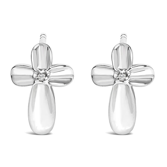 Front view of pair of white metal cross-shaped earrings each set with a round white gemstone in prong setting at the center.