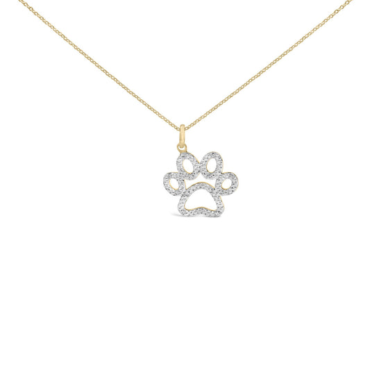 Close-up front view of a yellow metal necklace with a paw-shaped pendant embellished with white gemstones in pave setting.