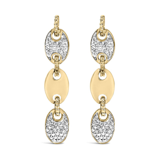 Close-up front view of yellow metal dangly earrings with alternating solid oval links and oval links with pave-set white round gemstones.