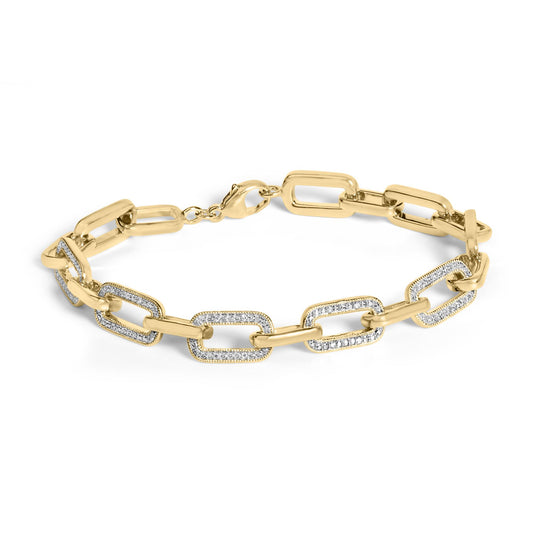 Close-up angle of a yellow metal link bracelet with some links featuring white gemstones in a pave setting, shown on a white background.