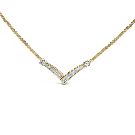 Close-up front view of a yellow and white metal necklace with a V-shaped pendant featuring two rows of small white gemstones in a visible setting.