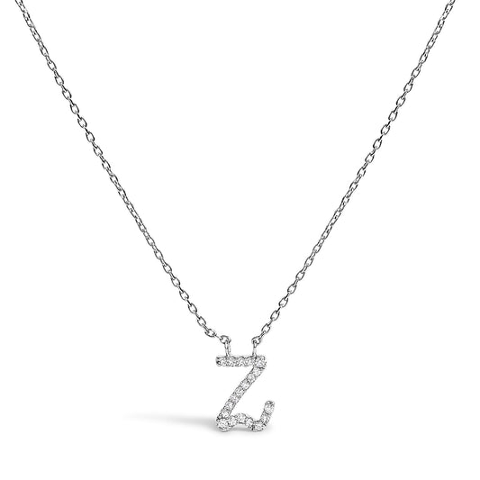 Front-facing close-up of a white metal necklace with a pendant in the shape of the letter Z adorned with small round white gemstones in a micro-pave setting.
