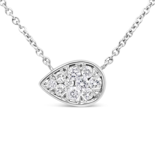 Close-up front view of a white necklace with a teardrop-shaped pendant featuring multiple round pave-set white gemstones.