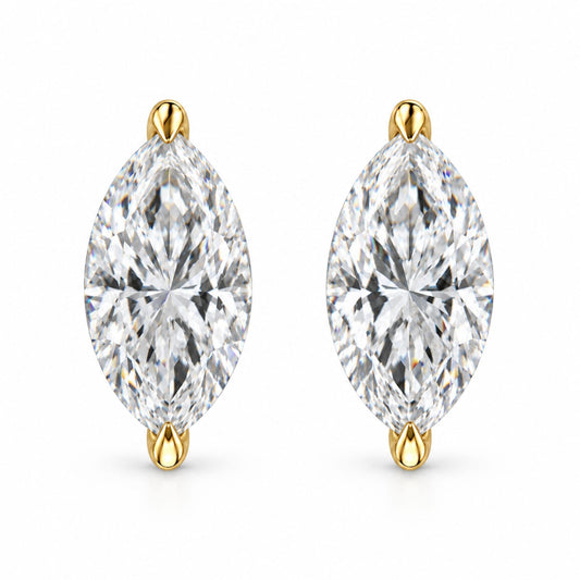 Close-up front view of a pair of yellow metal earrings featuring marquise-shaped white gemstones in a 2-prong setting.