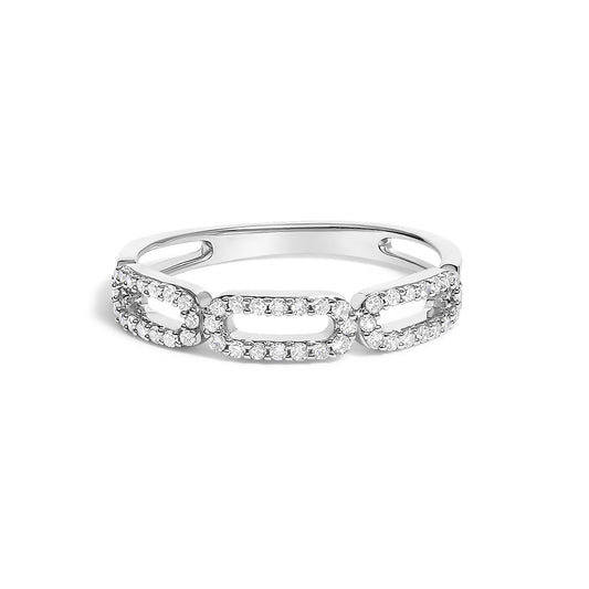 Close-up front angle of a white metal ring with linked oval shapes encrusted with numerous small round white gemstones in prong settings.