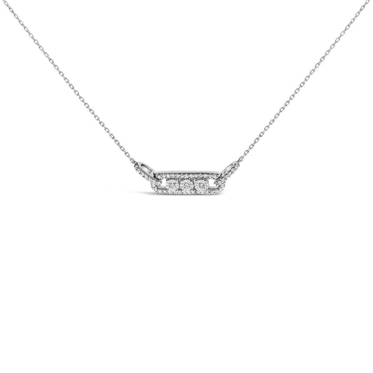 Front view of a white metal necklace with a horizontal rectangular pendant featuring three round white gemstones set in miracle setting, surrounded by multiple smaller round white gemstones in prong setting.