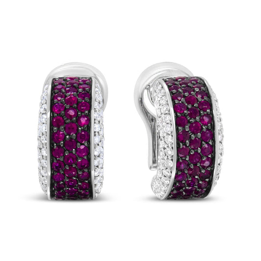 Close-up front and side view of white metal hoop earrings featuring rows of red and white round gemstones in prong settings.