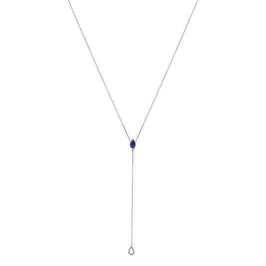 White necklace shown from the front with a pear-shaped blue gemstone set near the center and round white gemstones ending the vertical drop.