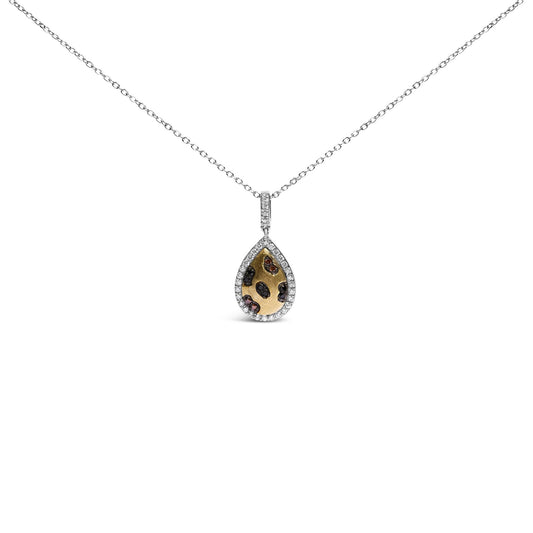 Front view of a yellow metal necklace with a teardrop-shaped pendant, featuring round orange and black gemstones inside and a border of white gemstones.