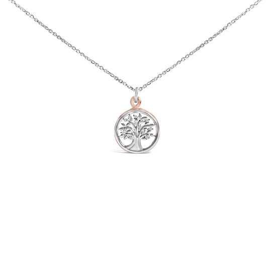 Close-up front view of a necklace with a round pendant featuring a tree design accented with white round prong-set gemstones, hanging from a white and rose-colored chain.