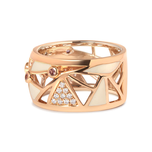 Rose metal ring with geometric cut-out design, featuring clusters of round white gemstones in pave setting and scattered round pink gemstones in bezel setting, shown in a close-up side angle.