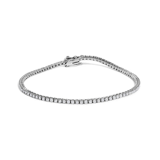 White metal tennis bracelet with round white gemstones in 4-prong settings, shown flat from a front angle.