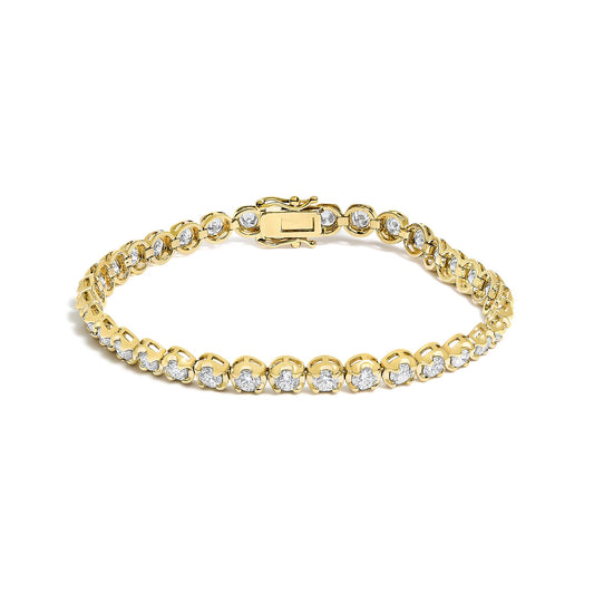 Yellow metal bracelet with round white gemstones in 4-prong settings, shown flat from a top angle.